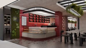 Enjoy a drink at the bar with a view of the lush greenery.