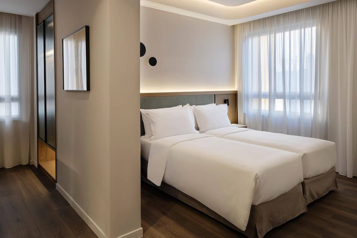 Cozy Triple | 1 bedroom, premium bedding, down duvets, Select Comfort beds