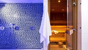 A modern bathroom with a mosaic tile wall, a wooden bench, and a visible shower area. - Dorint City-Hotel Salzburg (Salzburg)