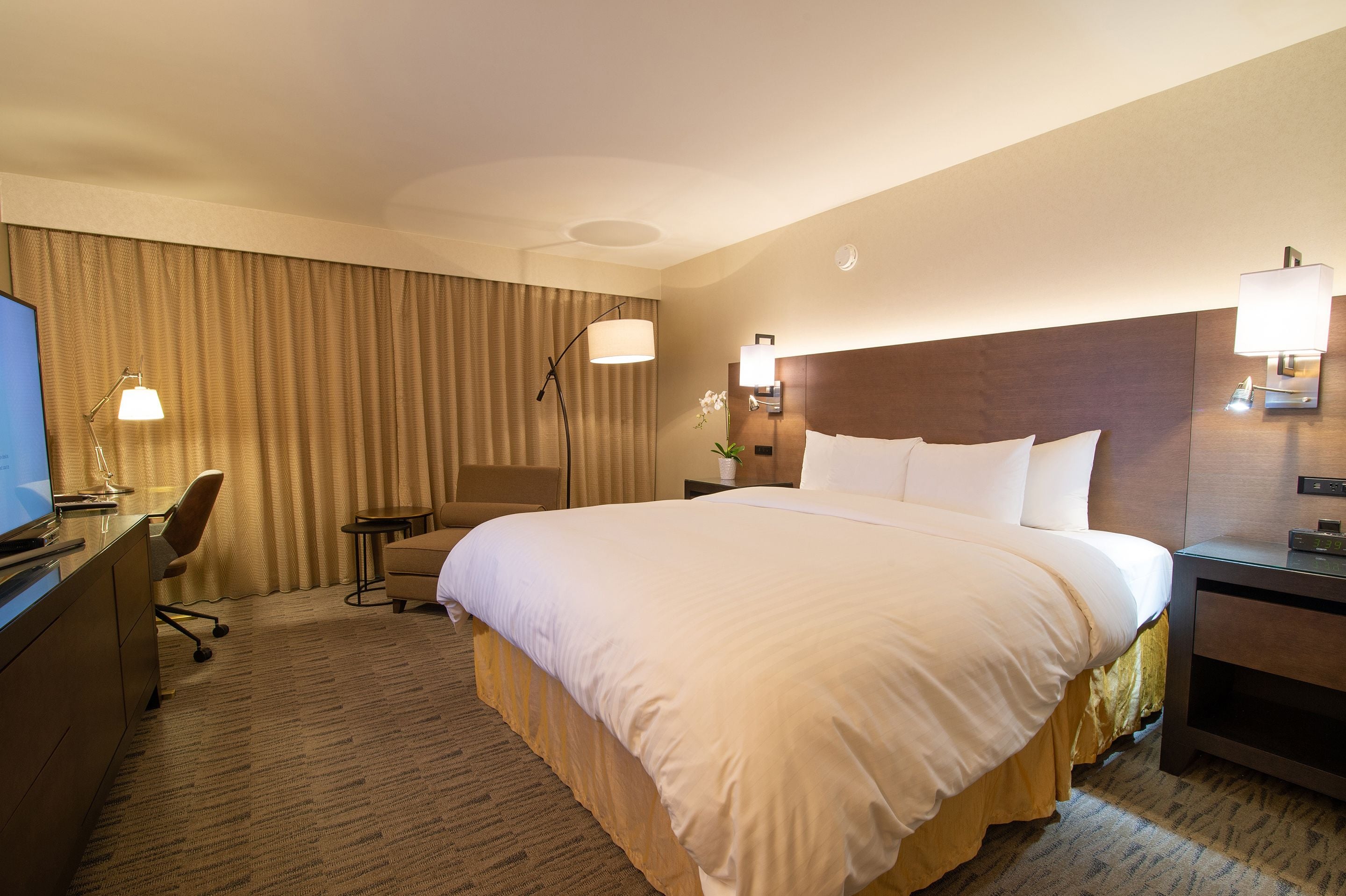 premium room, 1 king bed (premium executive king) | in-room safe, desk, iron/ironing board, free wifi