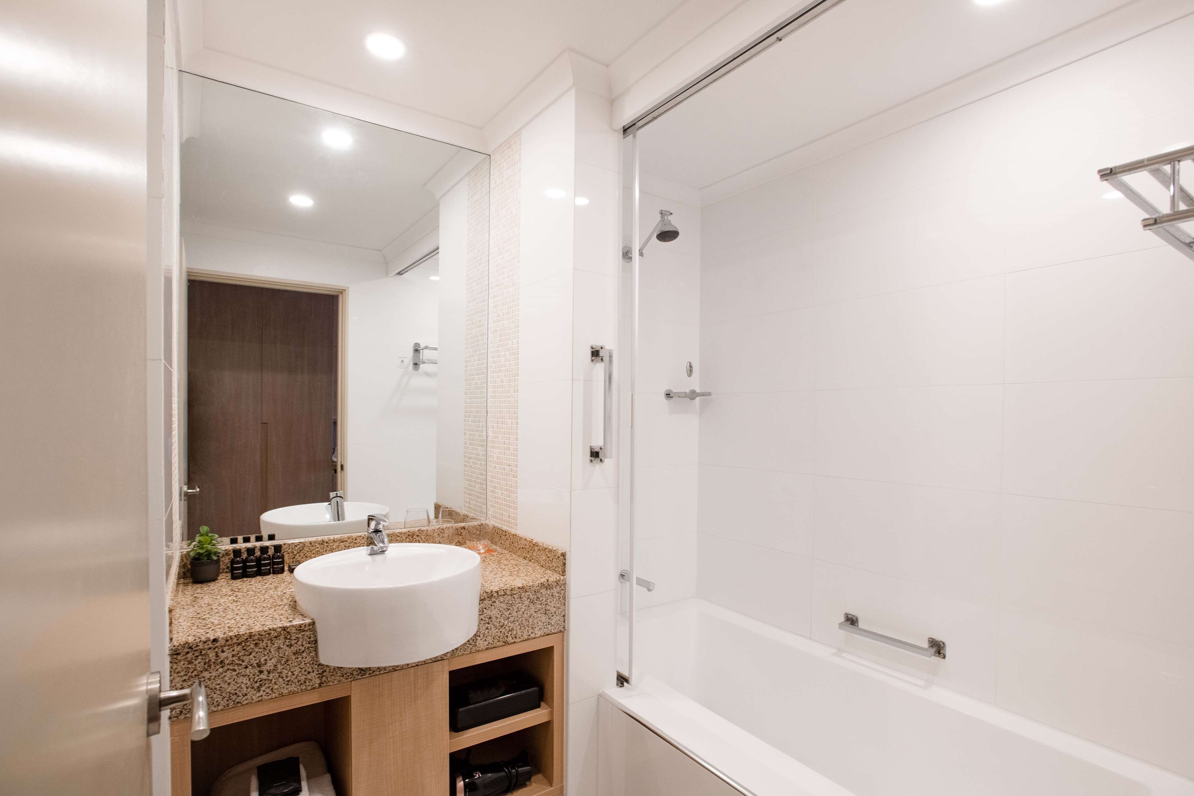 combined shower/bathtub, hair dryer, towels, soap