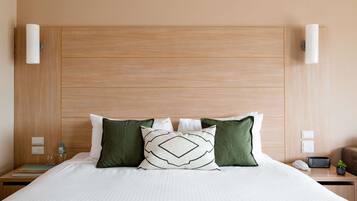 Family Room | In-room safe, desk, blackout drapes, iron/ironing board