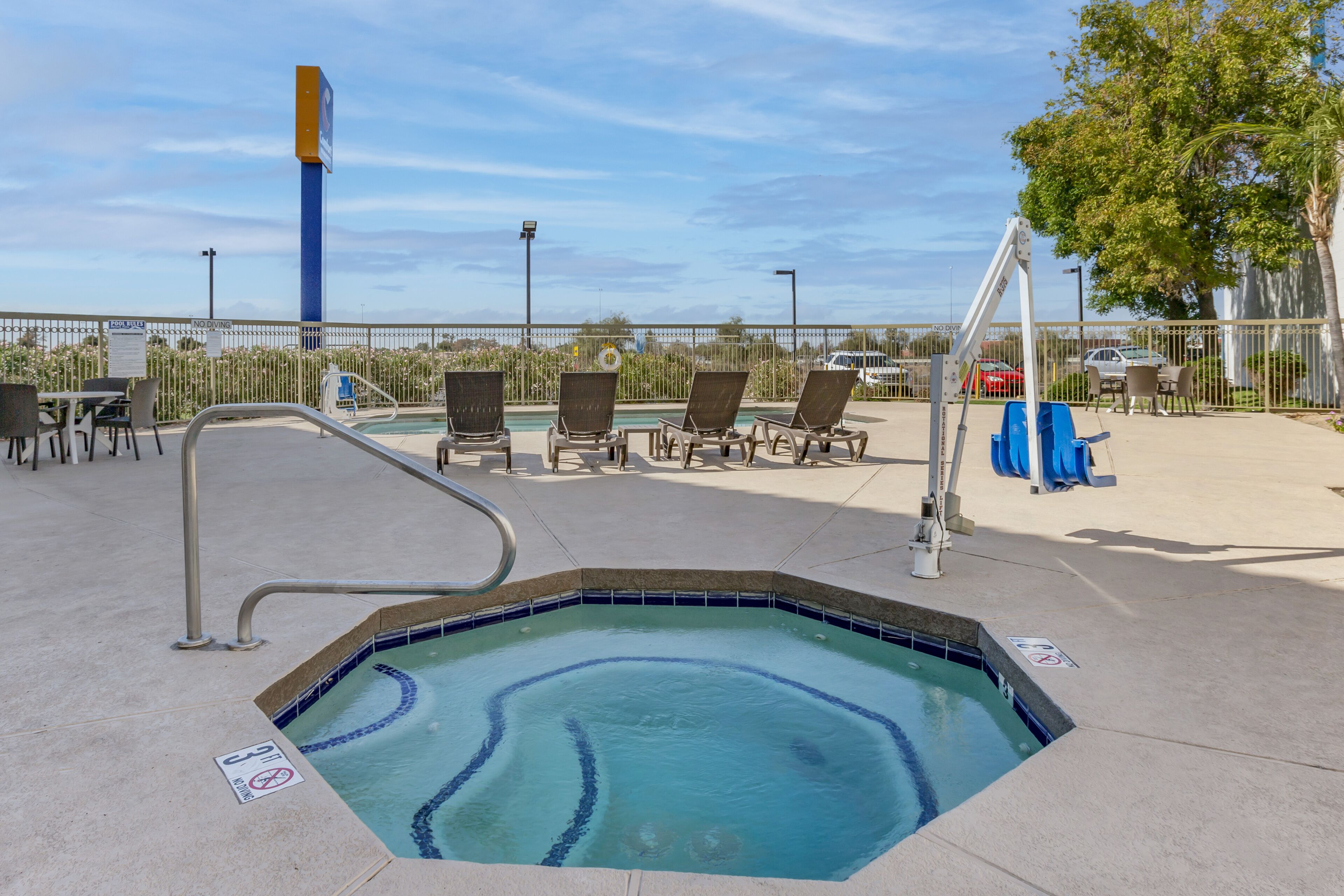 Outdoor pool, open 7:00 AM to 11:00 PM, pool umbrellas, pool loungers