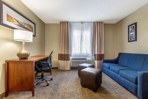 Deluxe Suite 1 King Bed, Sofa Bed, Sitting Area, Non-Smoking | In-room safe, desk, blackout drapes, soundproofing