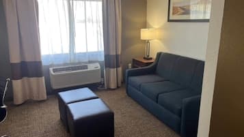 Suite, 1 King Bed with Sofa bed, Non Smoking | In-room safe, desk, blackout curtains, soundproofing