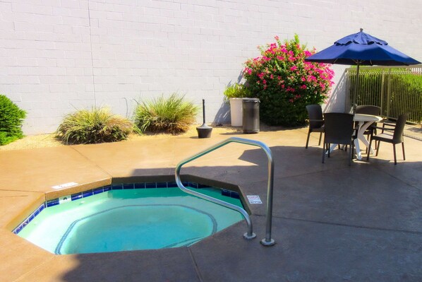Outdoor pool, open 7:00 AM to 11:00 PM, pool umbrellas, sun loungers