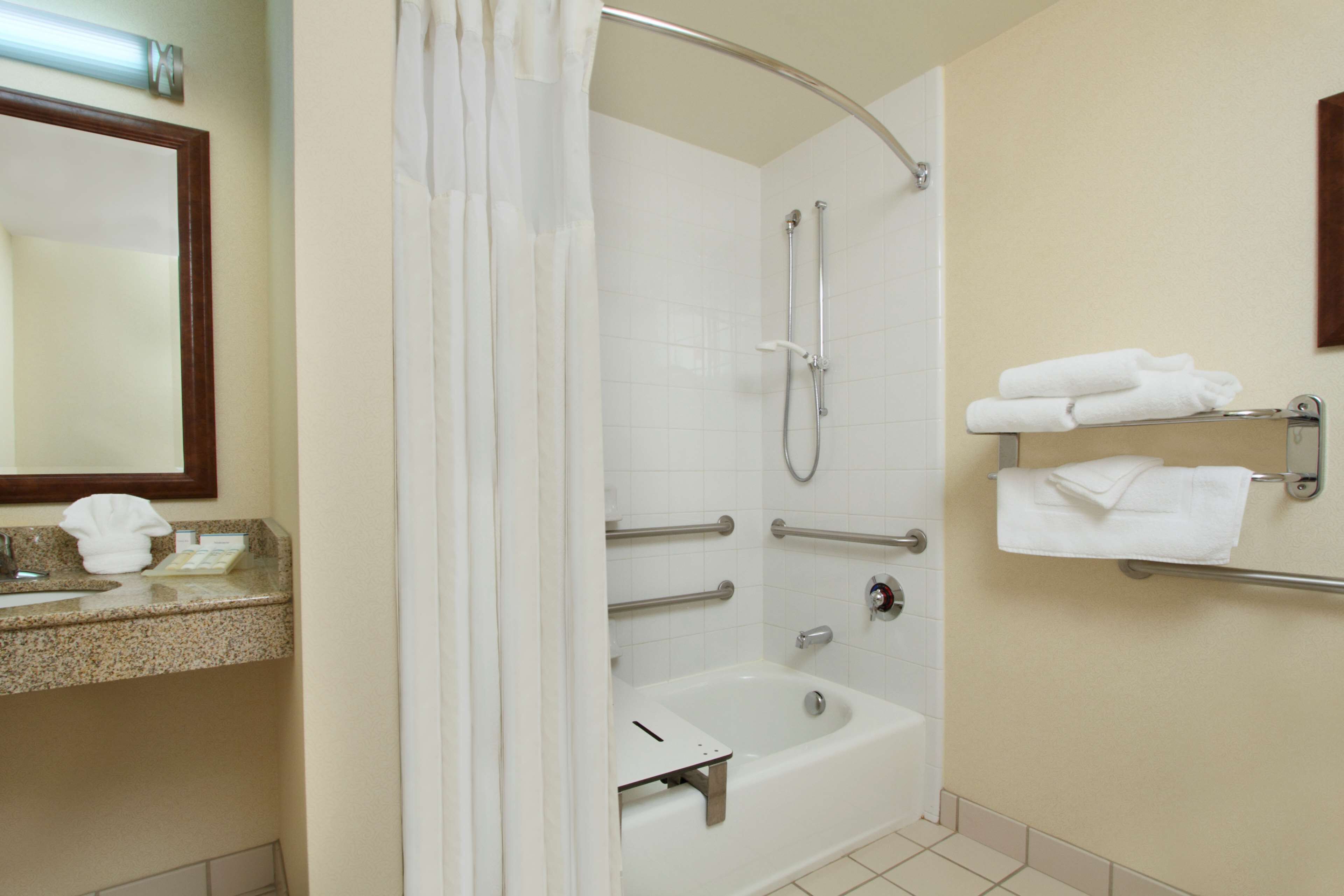 combined shower/bathtub, free toiletries, hair dryer, towels