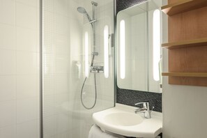 Shower, eco-friendly toiletries, hair dryer, towels