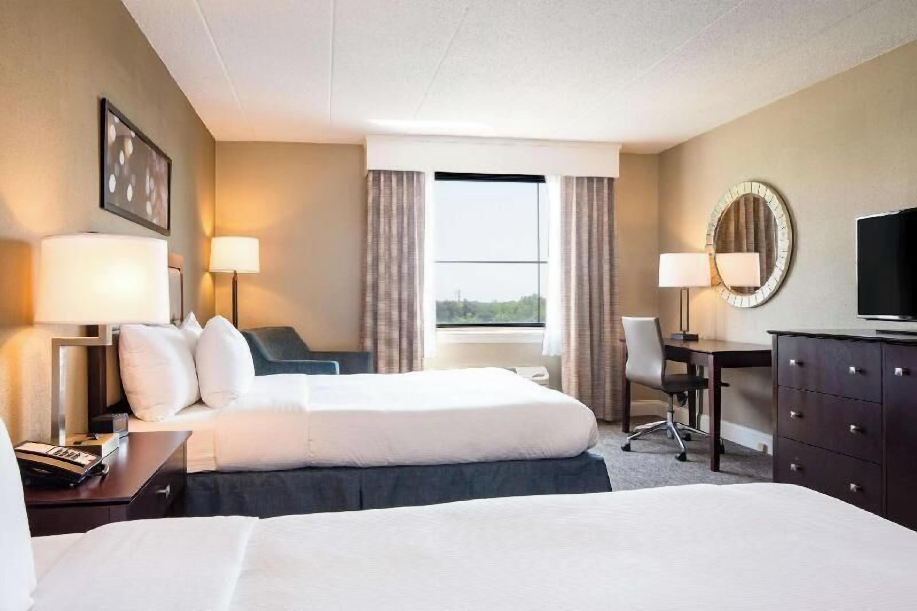 Premium bedding, down comforters, in-room safe, desk