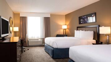 Premium bedding, down duvets, in-room safe, desk