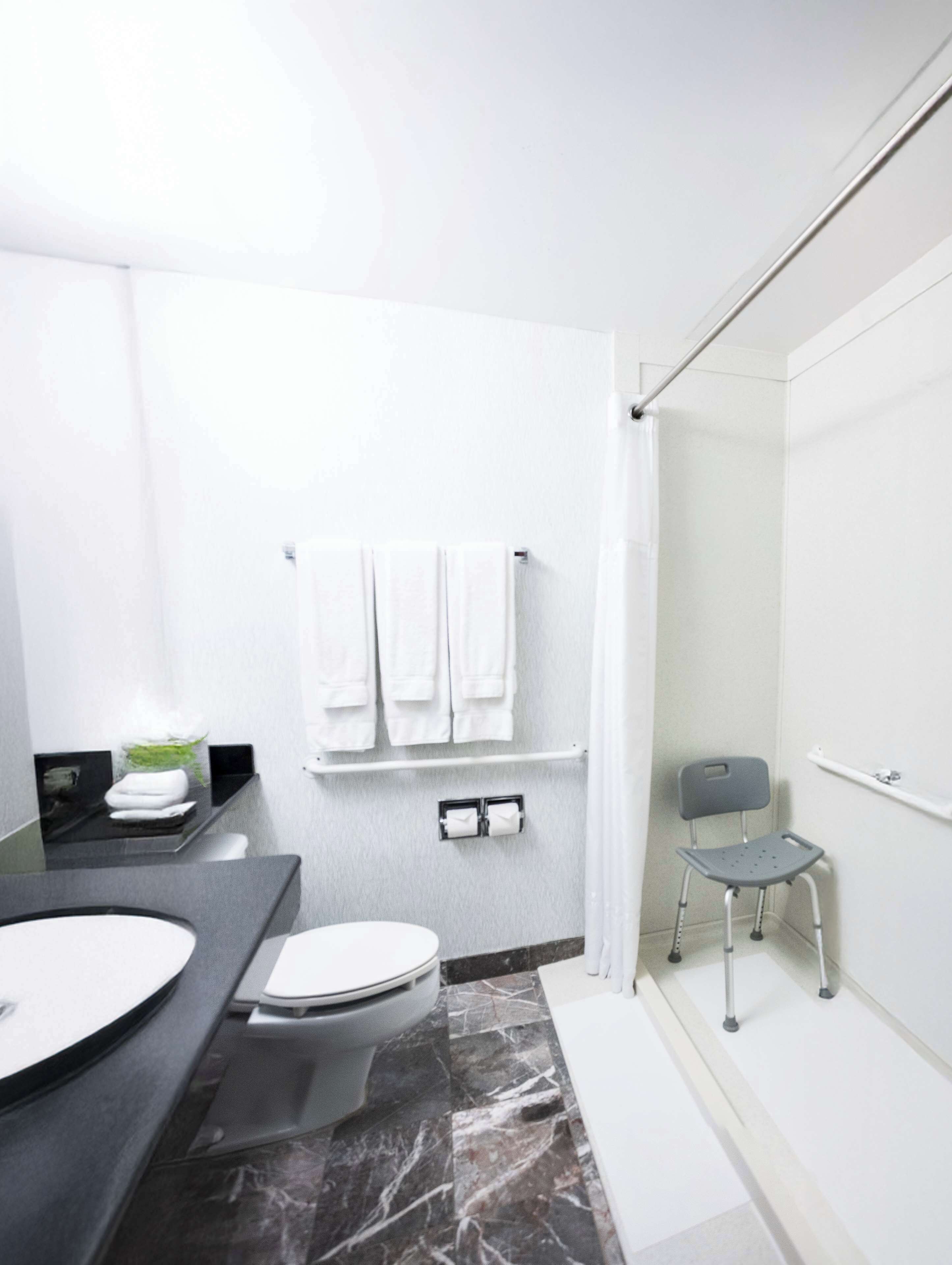 room, 2 queen beds, accessible | bathroom | combined shower/bathtub, free toiletries, hair dryer, towels