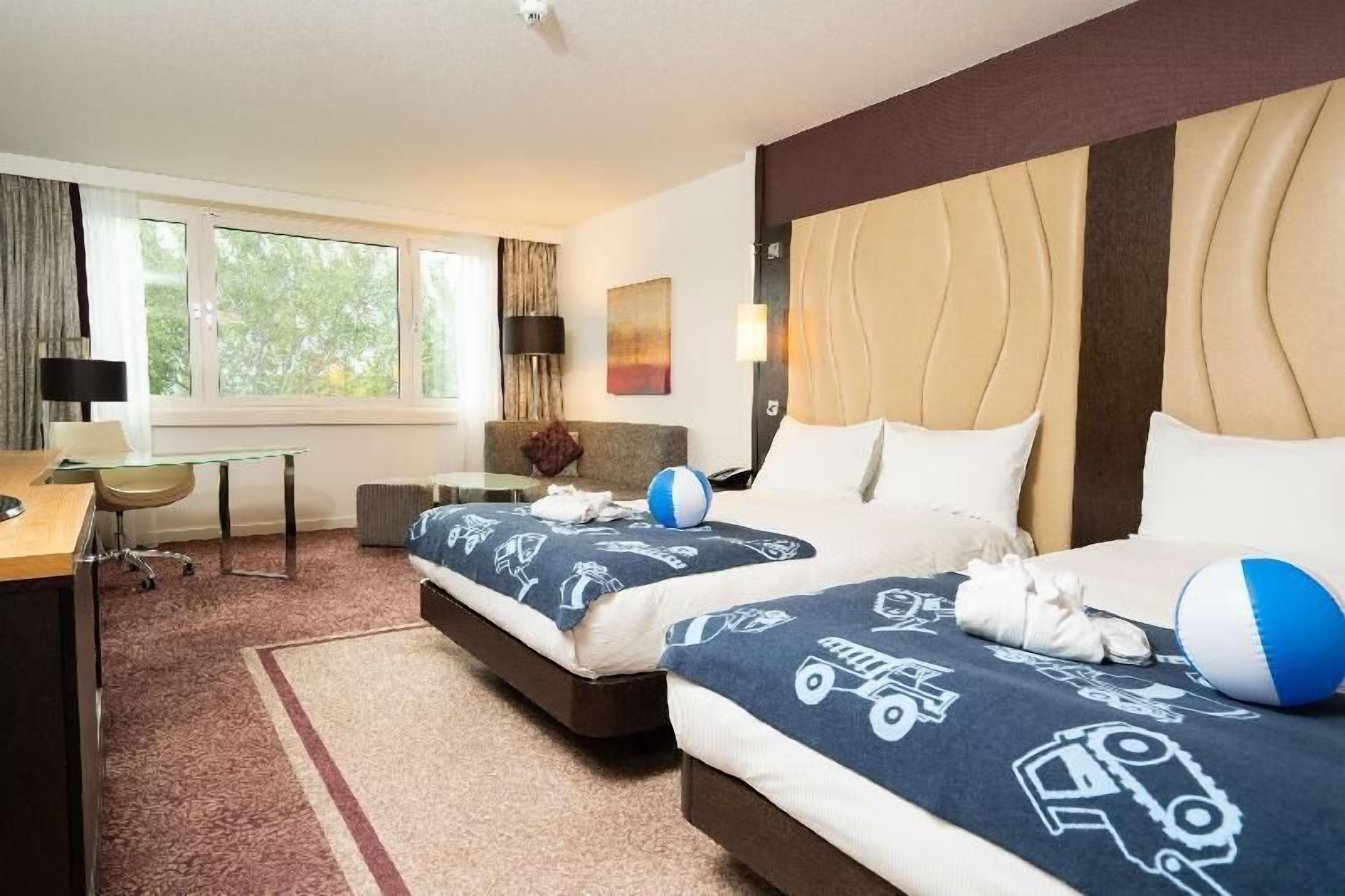 Biancheria da letto di alta qualità, minibar, cassaforte in camera