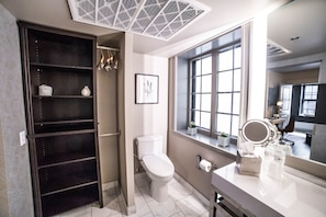 Shower, designer toiletries, hair dryer, bathrobes