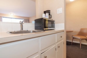 In-room safe, desk, laptop workspace, iron/ironing board