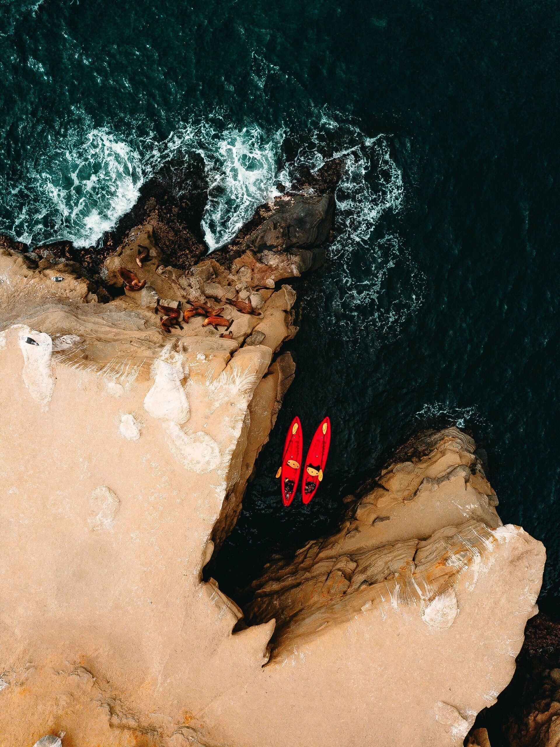 A rocky coastline with a narrow passageway.