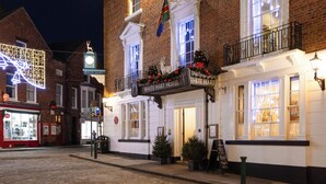 A traditional brick building with a sign reading "WHITE HART HOTEL". - White Hart Hotel (Lincoln)