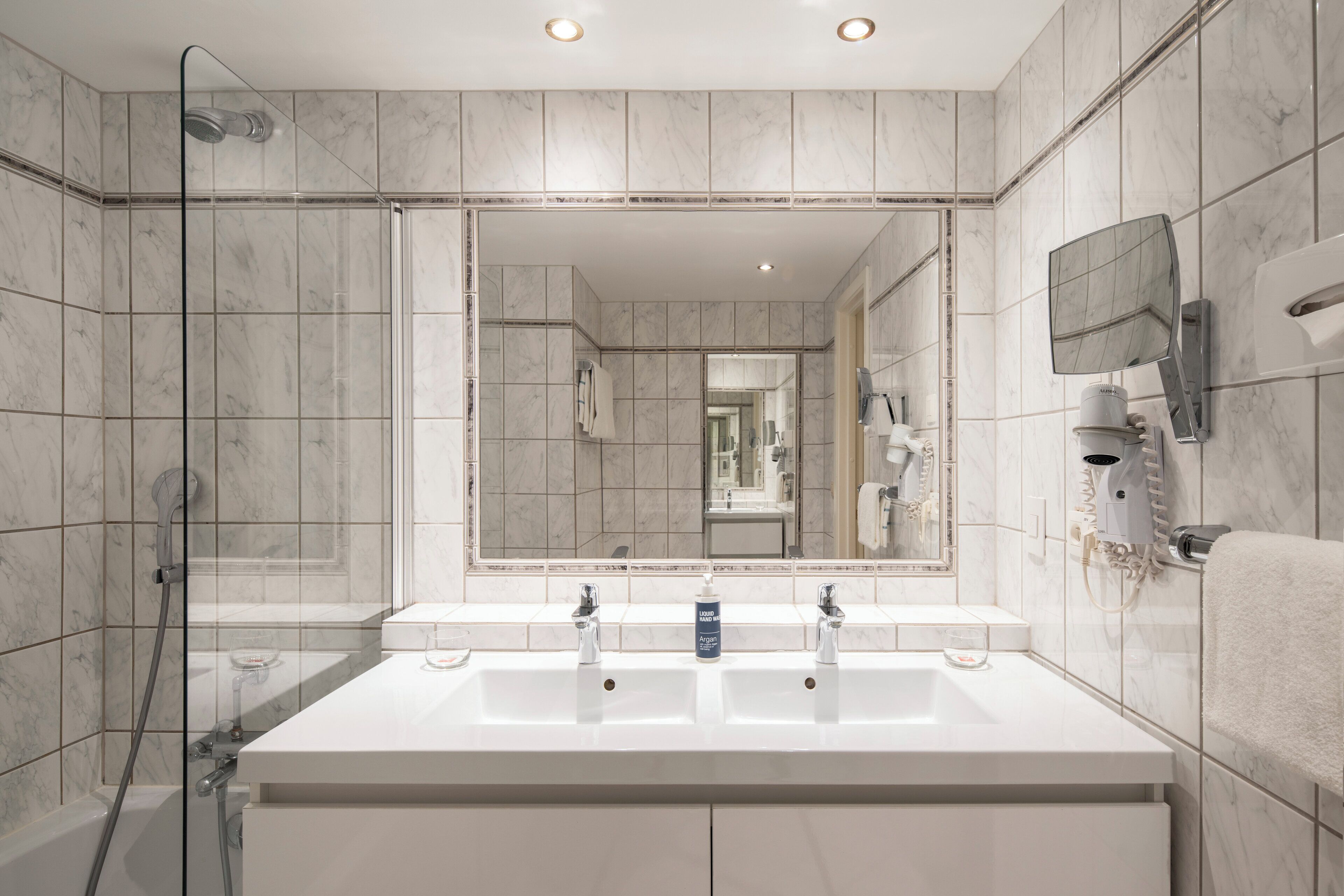 eco-friendly toiletries, hair dryer, towels