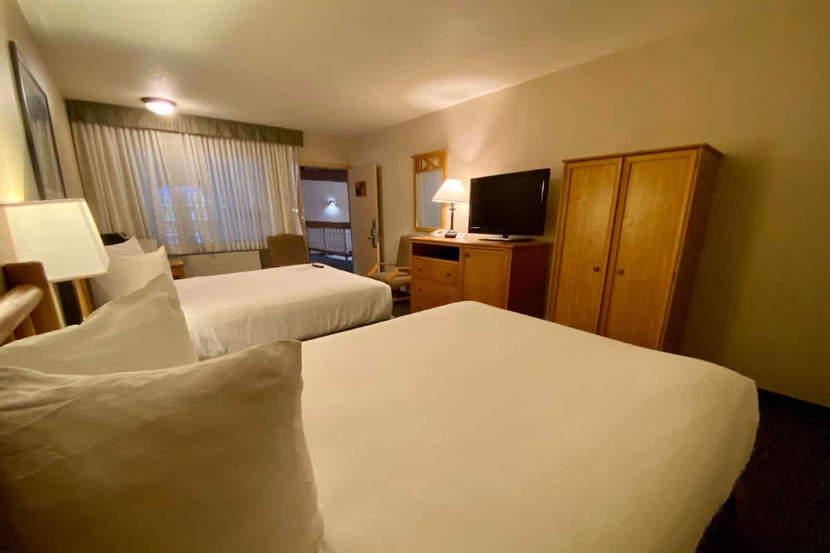 Blackout curtains, iron/ironing board, free cots/infant beds