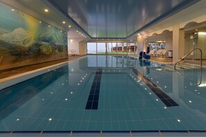 Indoor pool, outdoor pool, pool umbrellas