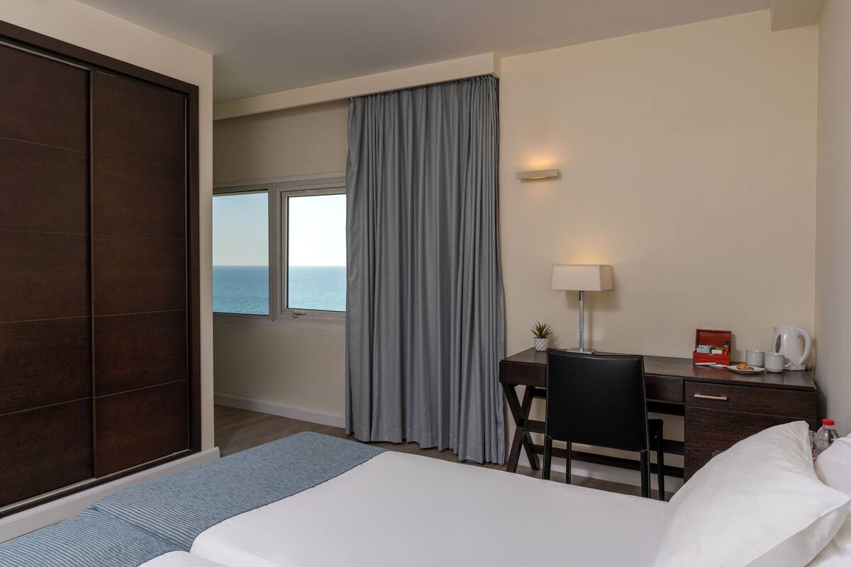 Chambre Économique avec lits jumeaux | Minibar, coffres-forts dans les chambres, Wi-Fi gratuit, draps fournis
