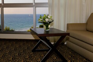Deluxe Room, Sea View | Living area | Flat-screen TV