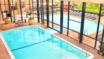 Indoor pool, outdoor pool, open 7:00 AM to 10:00 PM, pool loungers