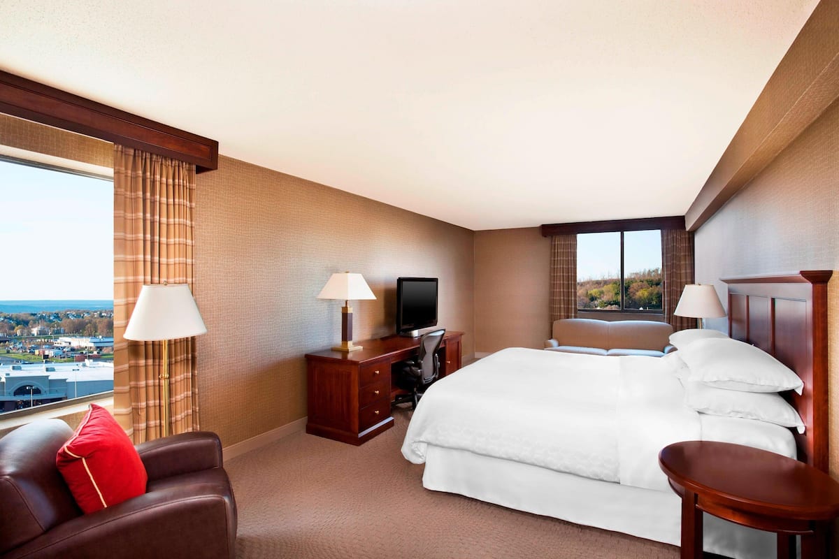 room, 1 king bed with sofa bed, non smoking, corner | in-room safe, desk, blackout curtains, iron/ironing board