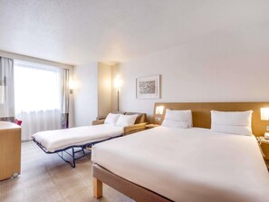 Premium bedding, memory foam beds, in-room safe, desk