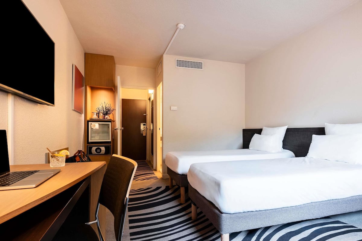 Premium bedding, memory foam beds, in-room safe, desk