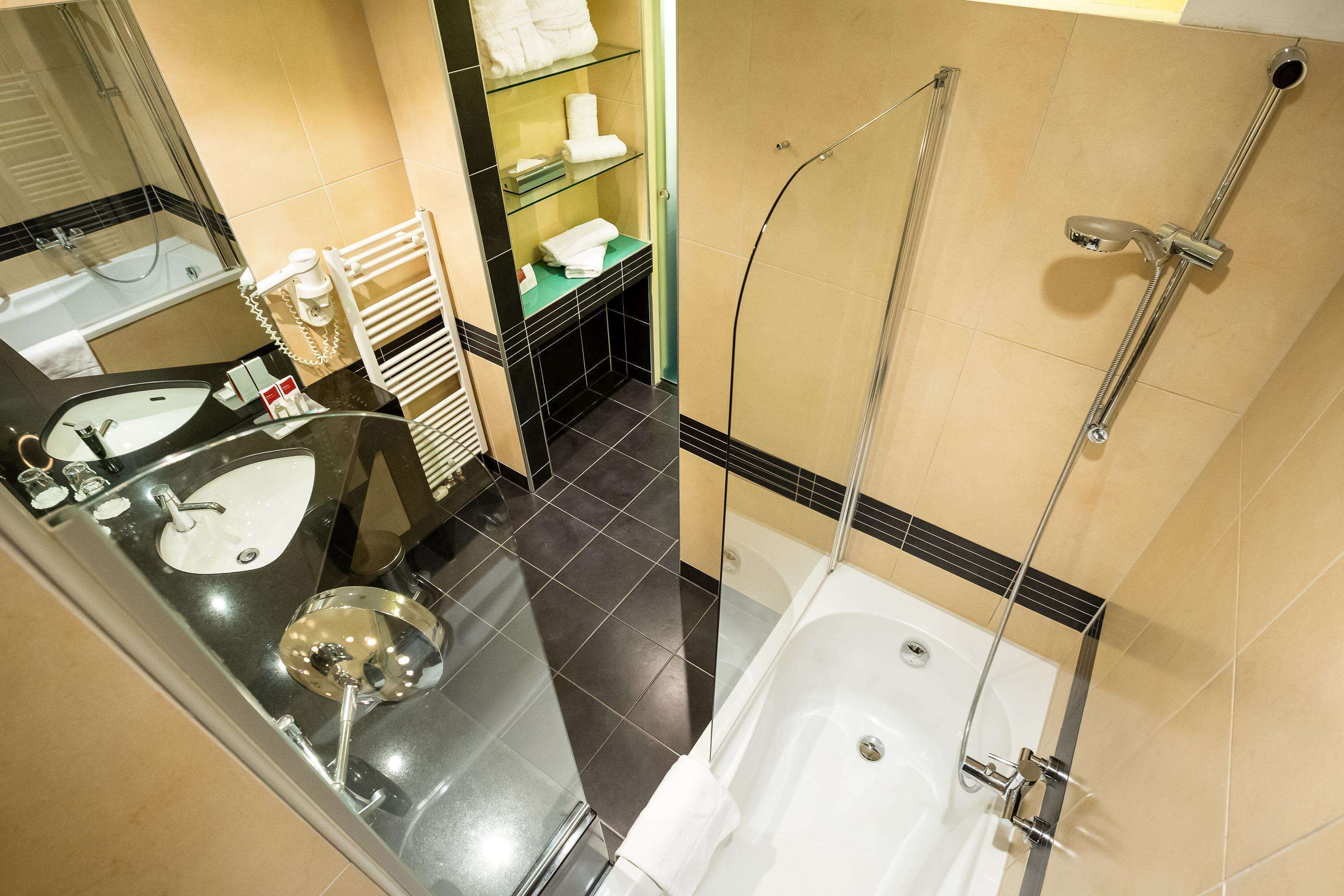 premium room | bathroom | hair dryer, towels, soap, shampoo