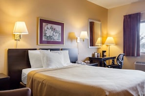 Chambre Standard, 1 grand lit | Literie de qualité, coffre-fort, bureau, fer et planche à repasser