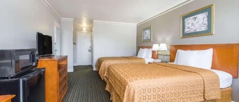 Desk, laptop workspace, blackout drapes, iron/ironing board