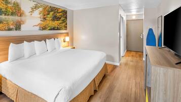 Room, 1 King Bed, Accessible, Non Smoking (Roll-In Shower) | Desk, laptop workspace, blackout drapes, iron/ironing board