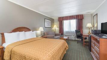 Desk, laptop workspace, blackout drapes, iron/ironing board