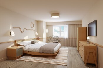 Premium bedding, pillowtop beds, in-room safe, desk at The Ryder Hotel