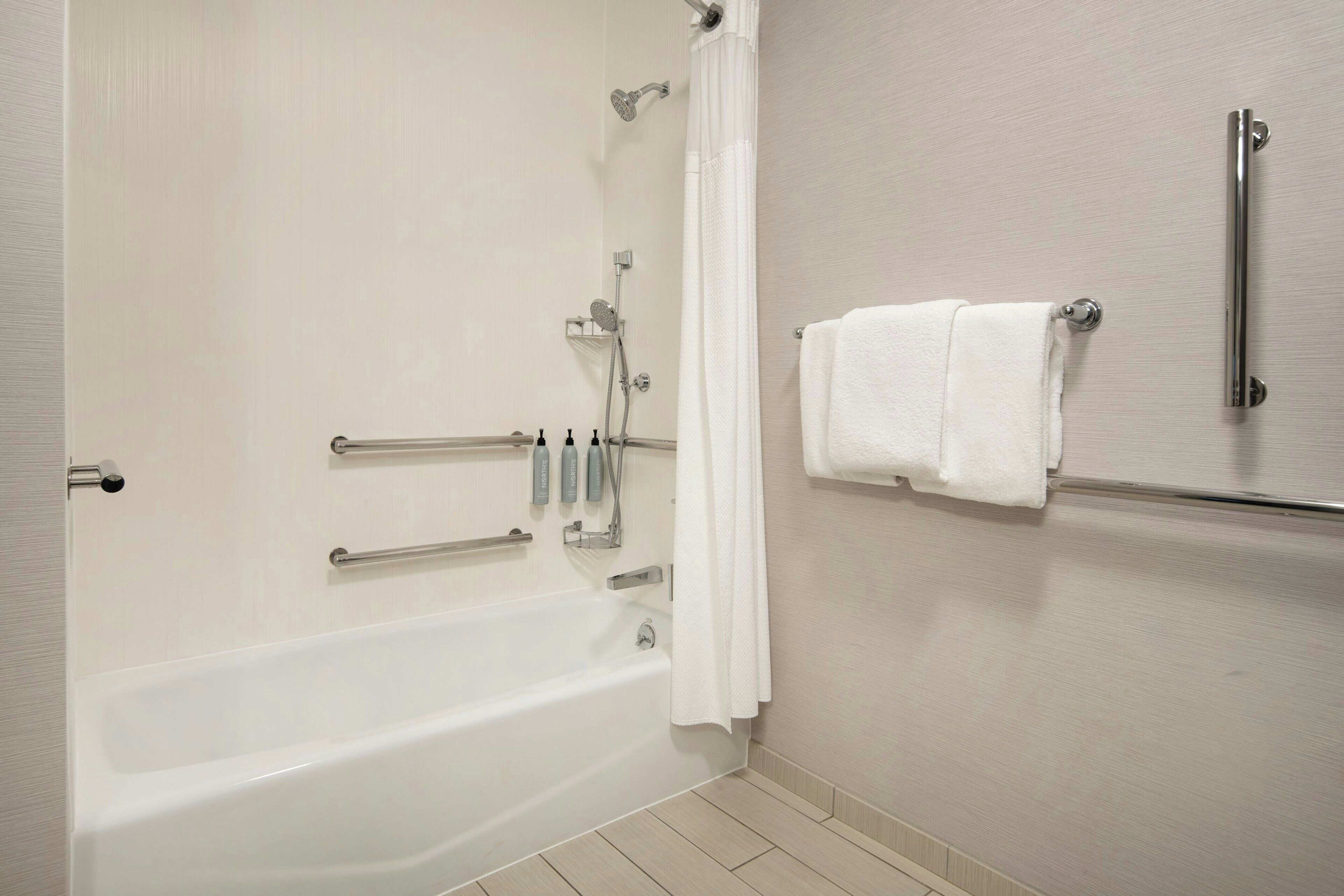 combined shower/bathtub, free toiletries, hair dryer, towels