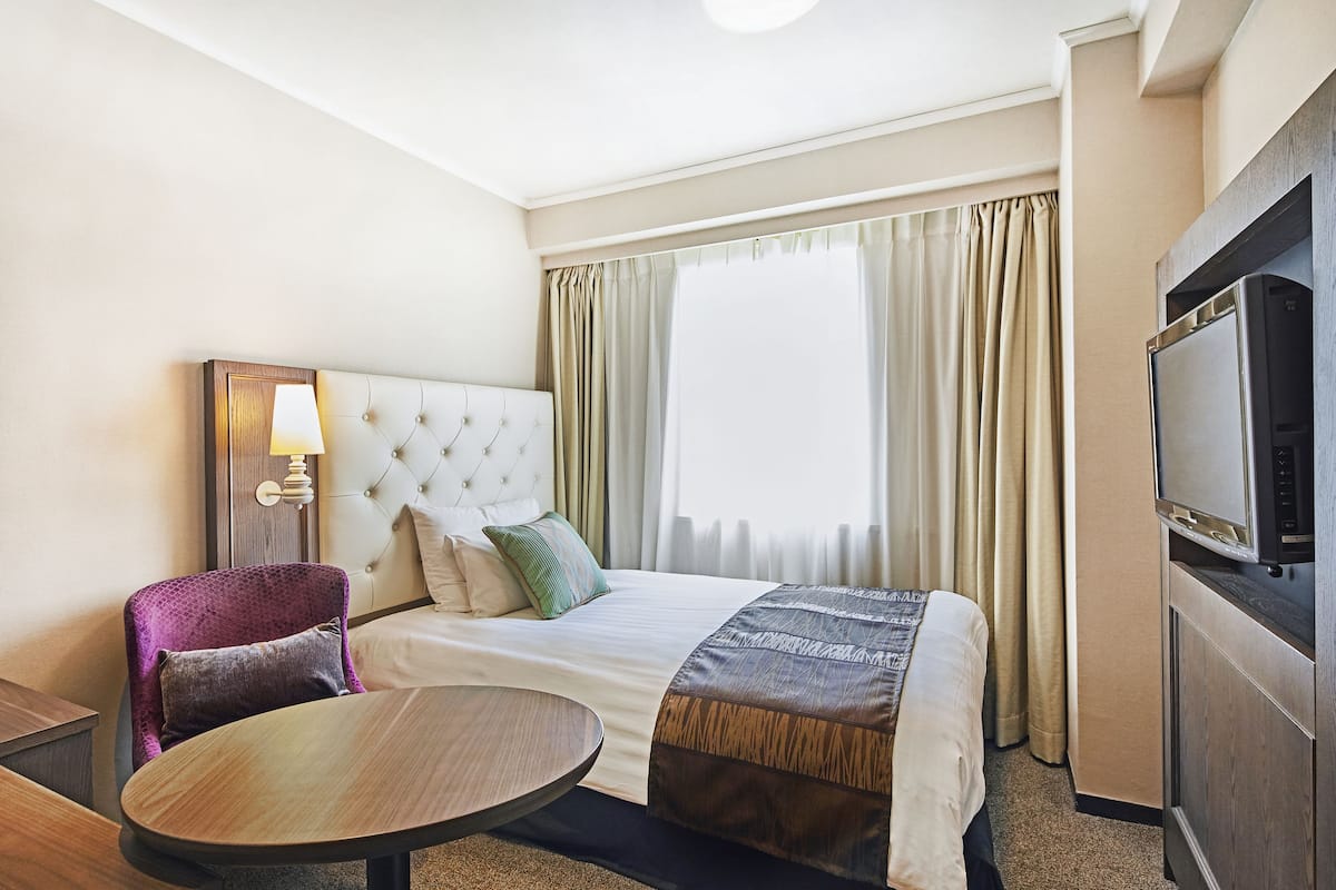 Premium bedding, down duvets, blackout curtains, soundproofing