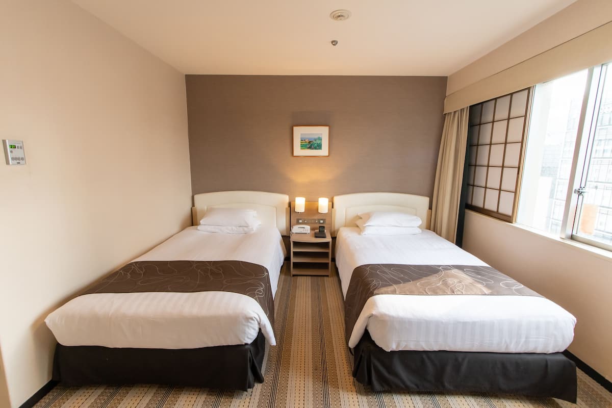 Premium bedding, down duvets, blackout curtains, soundproofing