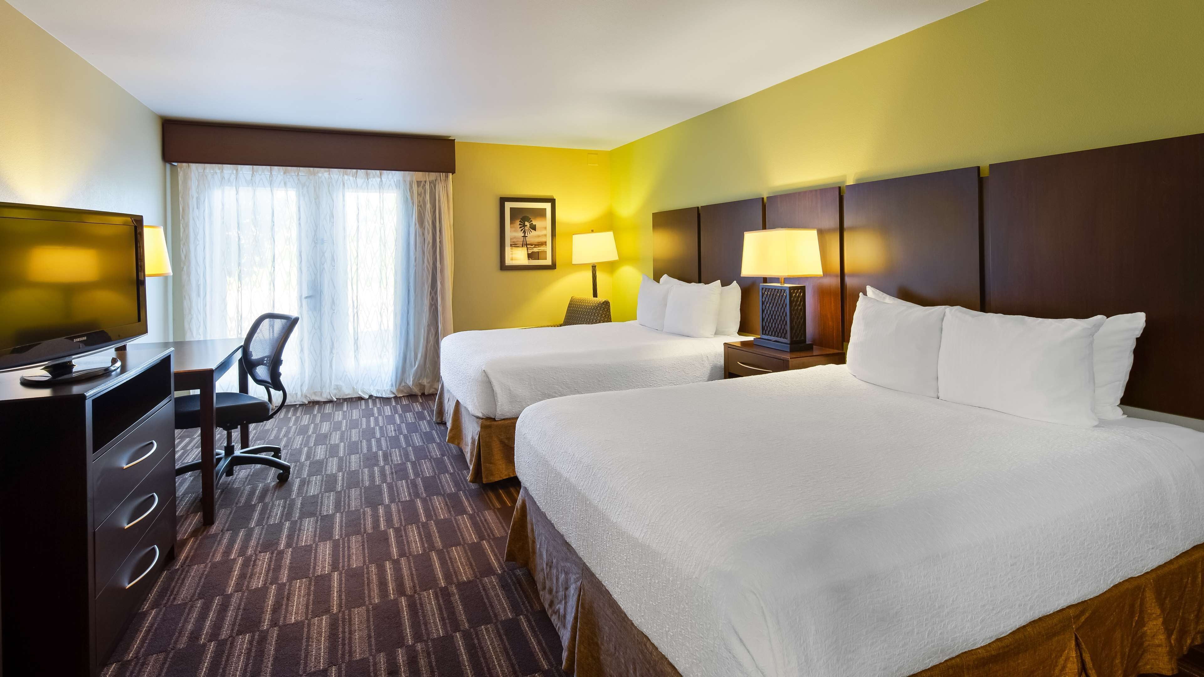 standard room, 2 queen beds, non smoking | 1 bedroom, in-room safe, laptop workspace, blackout curtains