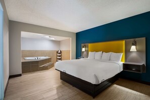 Suite, 1 King Bed, Non Smoking, Jetted Tub | Desk, iron/ironing board, free wired internet, bed sheets