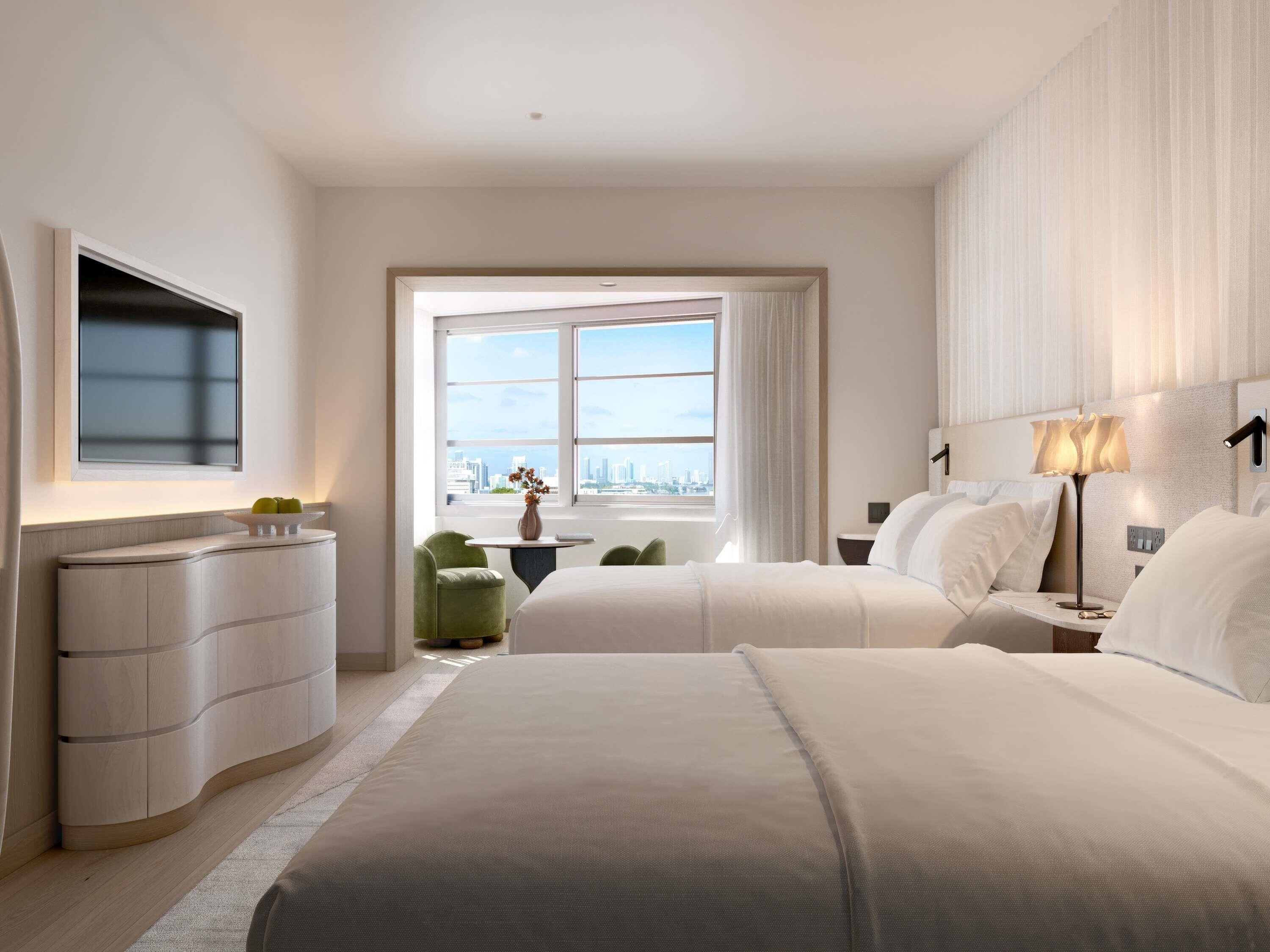 Chambre Double, vue ville (Accessible) | Literie de qualité supérieure, couette en duvet d'oie, minibar