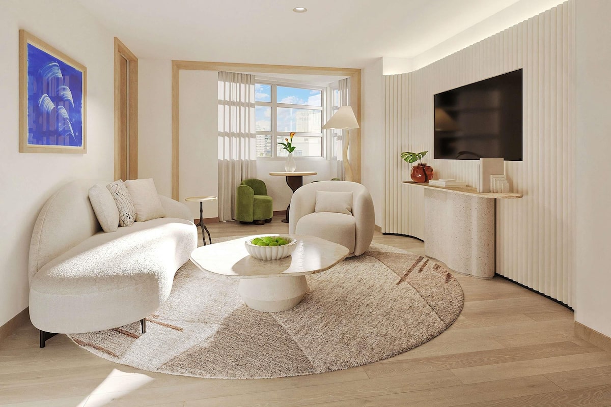 Partial Ocean View King Suite | Premium bedding, down comforters, minibar, in-room safe