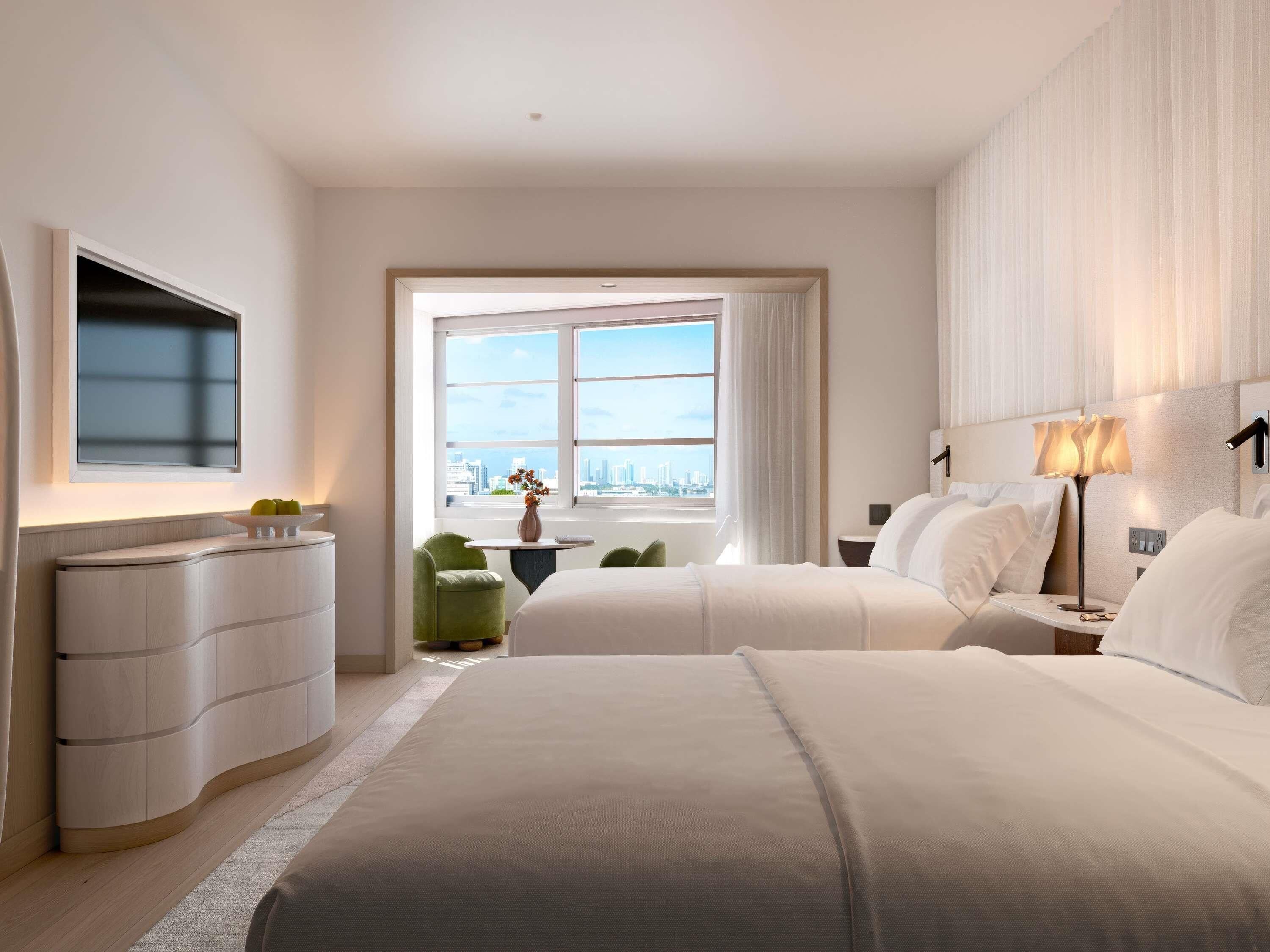 고급 침구, 오리/거위털 이불, 미니바, 객실 내 금고