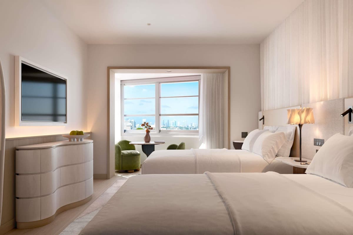 Premium bedding, down comforters, minibar, in-room safe