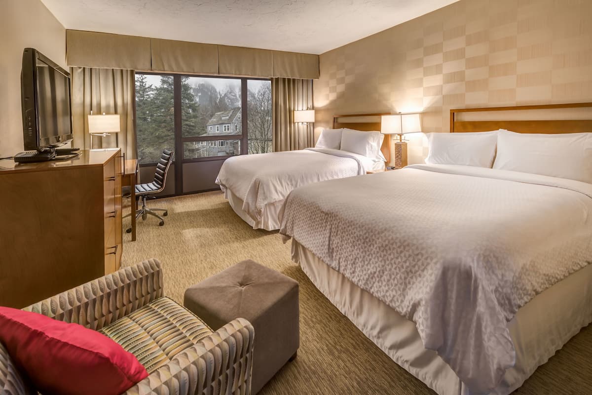 premium bedding, pillow-top beds, desk, blackout curtains