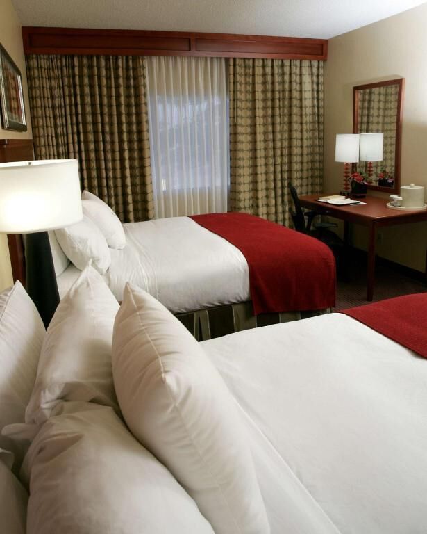 Down comforters, pillowtop beds, in-room safe, desk
