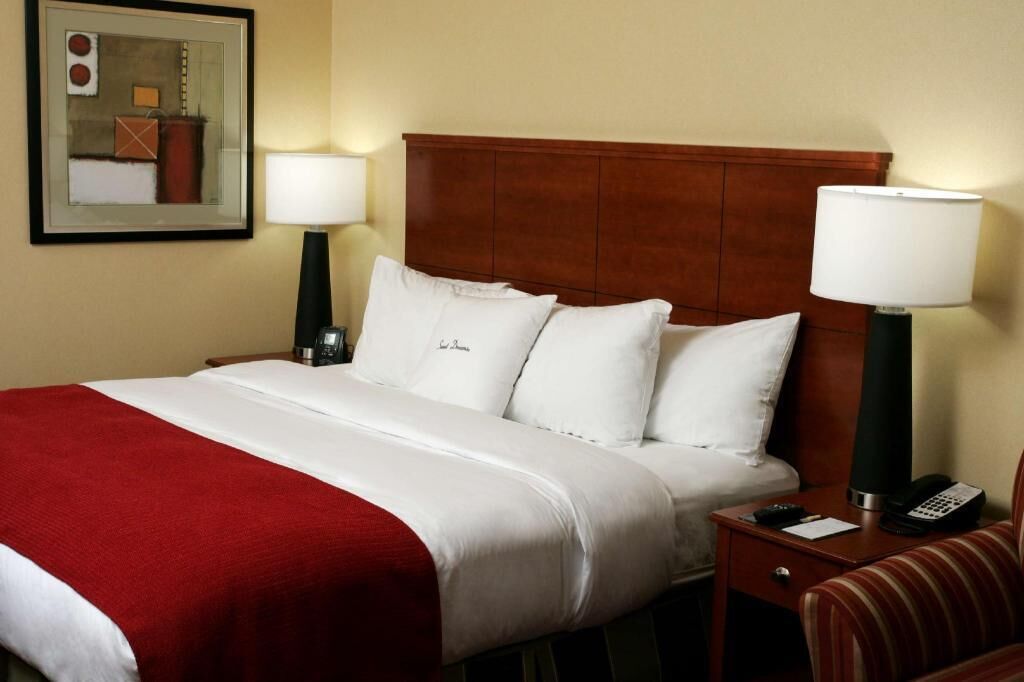 Down comforters, pillowtop beds, in-room safe, desk