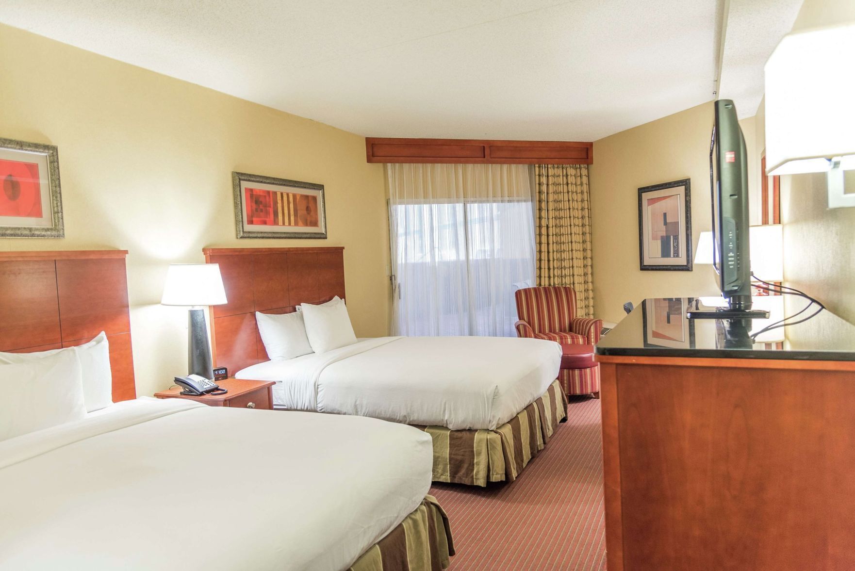 Down comforters, pillowtop beds, in-room safe, desk