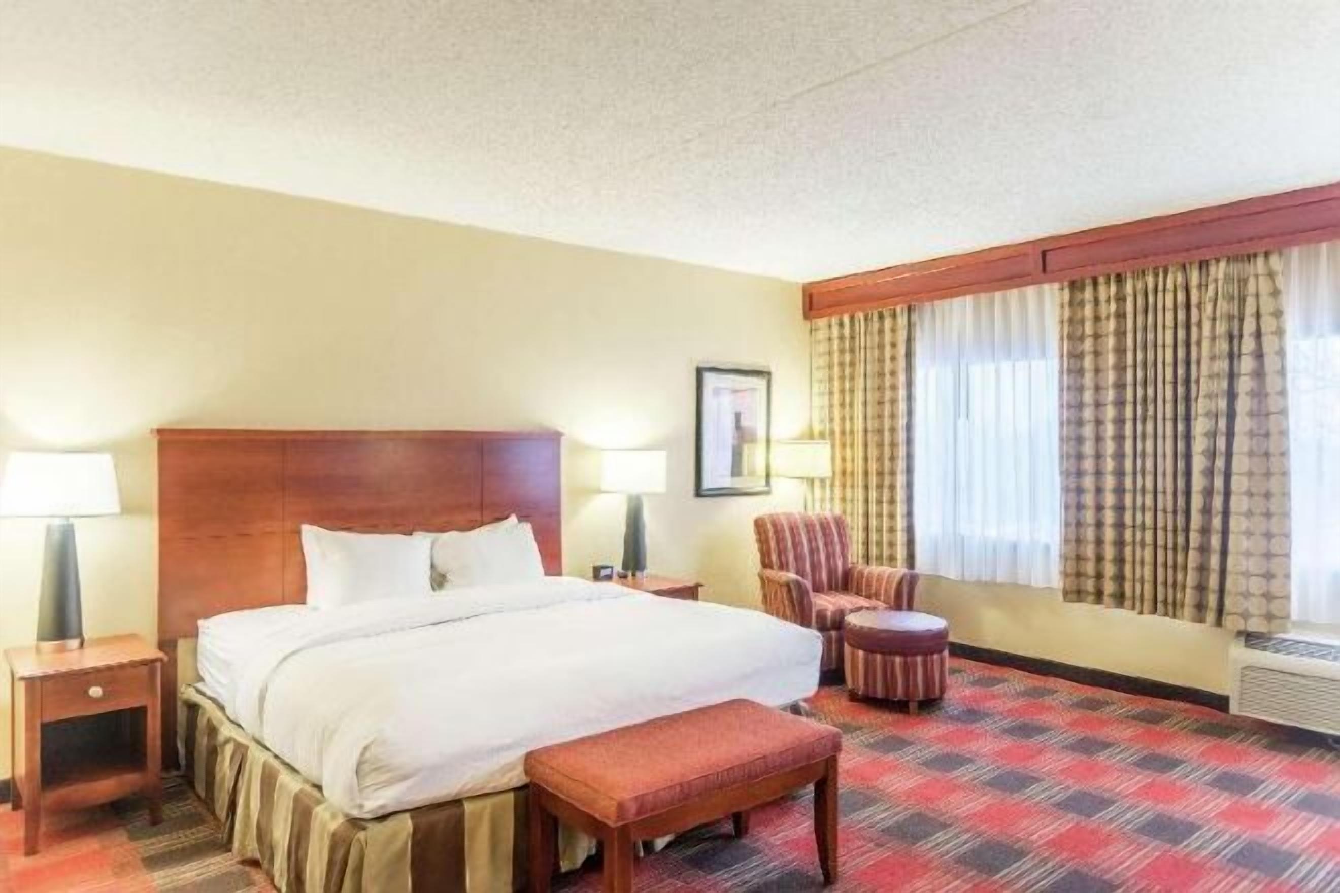 Down duvets, pillow-top beds, in-room safe, desk