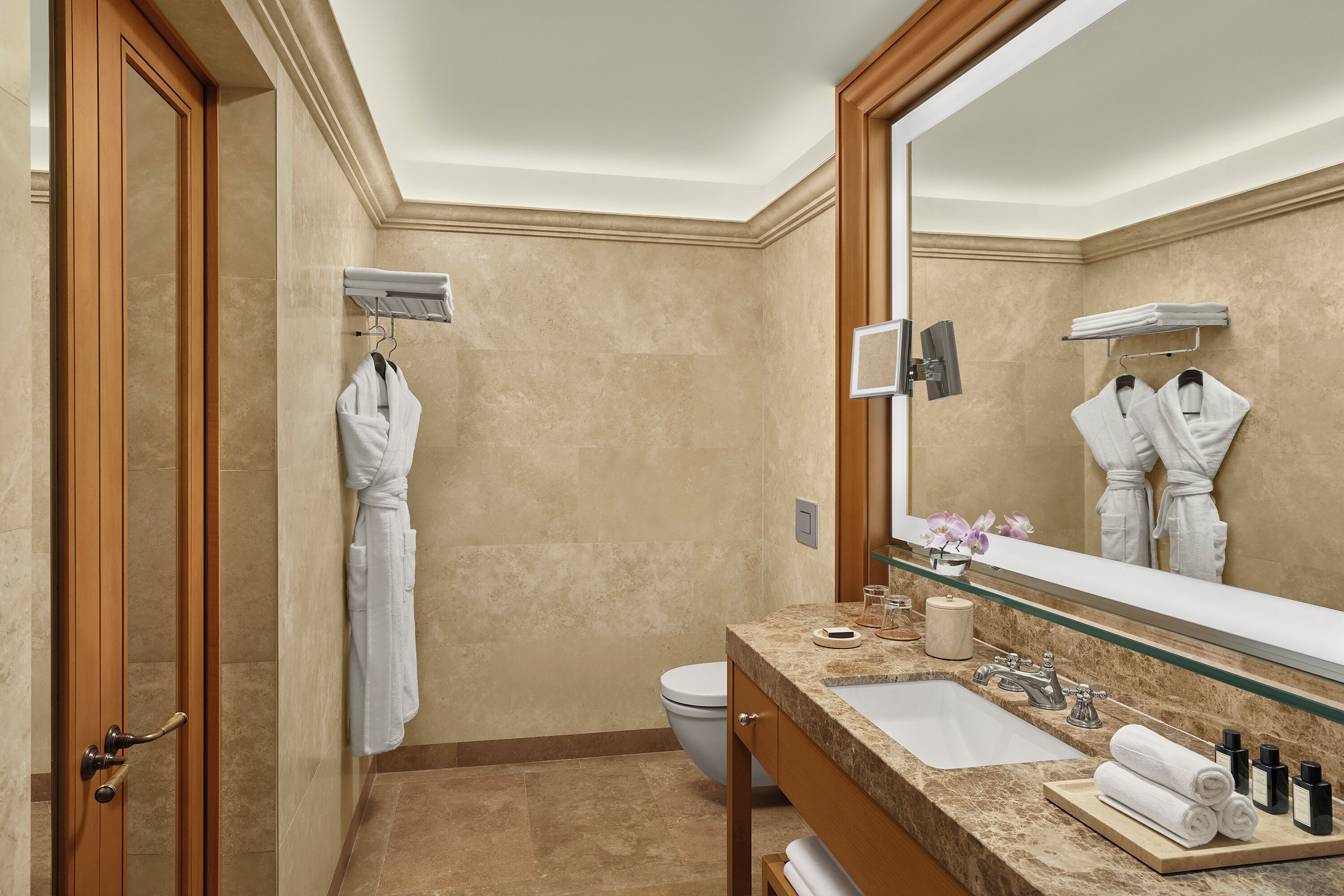 combined shower/bathtub, rainfall showerhead, designer toiletries